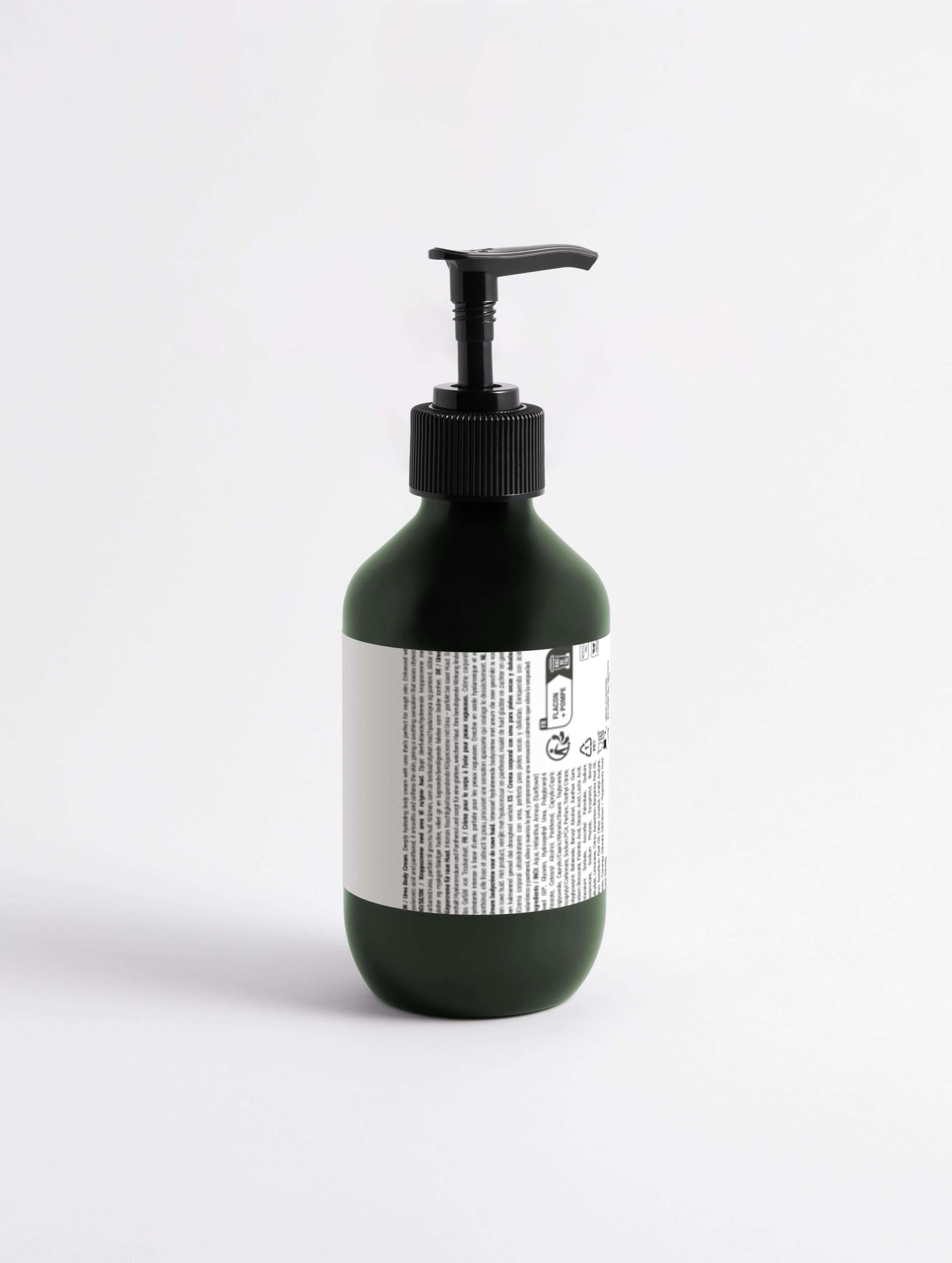 5% Urea + 2% Panthenol Body Cream in a dark green pump bottle, perfect for deep hydration.